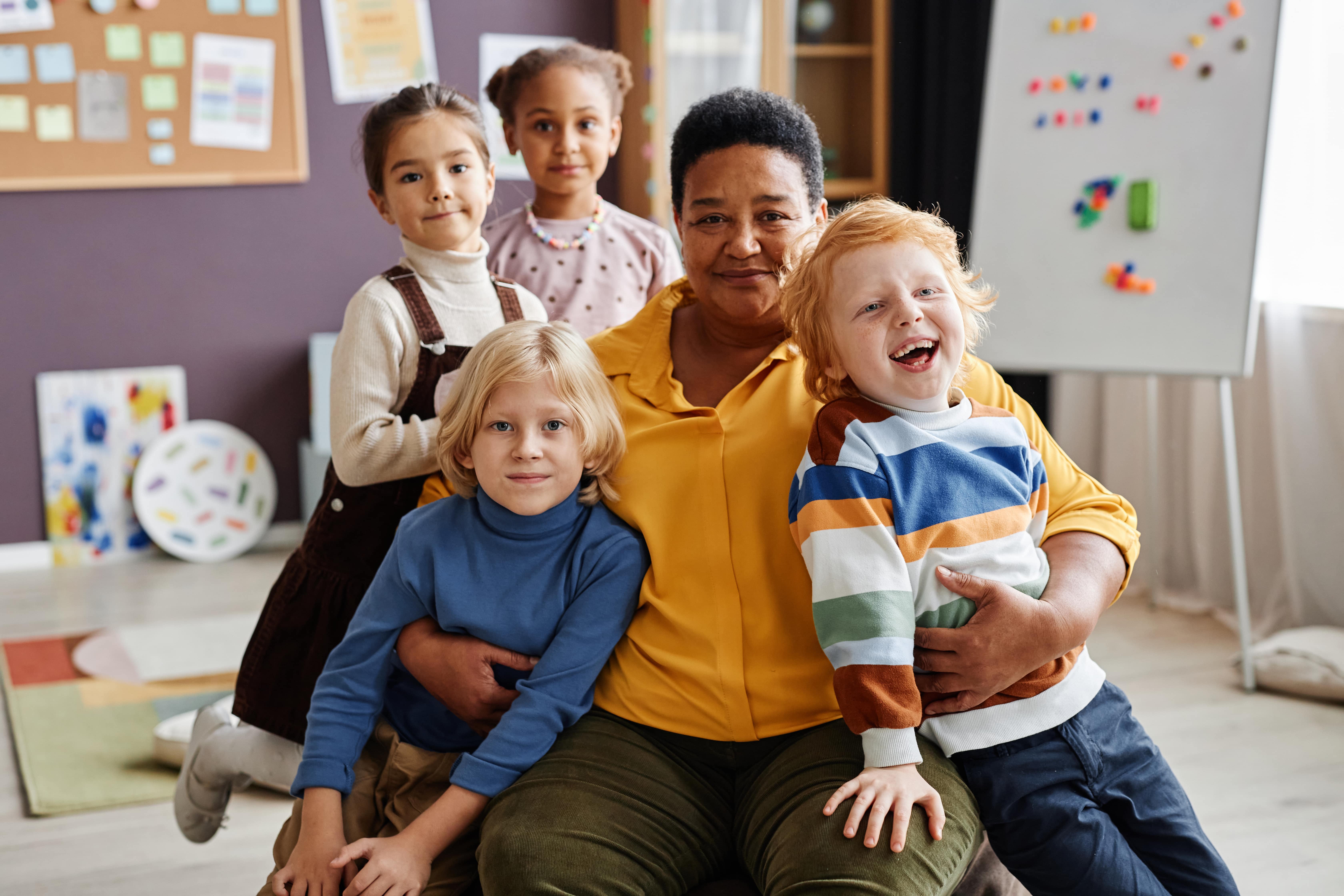 laughing-boy-and-other-little-learners-standing-by-2025-03-08-12-00-41-utc-min